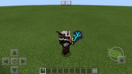 Кратос с мощным оружием в руках