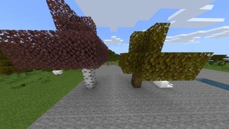 Розовые и оранжевые листья деревьев