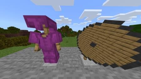 Украшенная броня и круглый деревянный щит