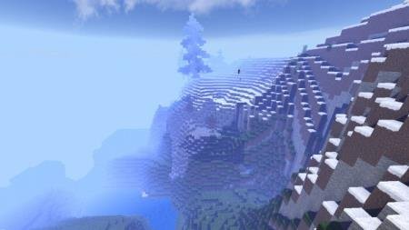 Вид на ёлку, расположенную на холме, в мире, заполненном голубым туманом