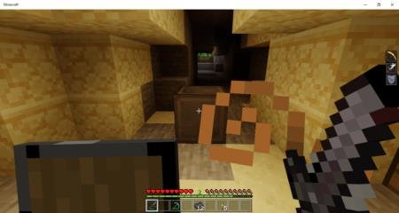 Игрок с мечом и щитом в руках идёт по пещере