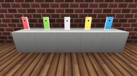 Пять расцветок Айфона 5c в игре на стенде