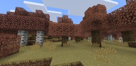 Красные листья деревьев и жёлтая трава в осенний период Майнкрафт