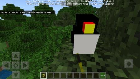 Тукан сидит на дереве