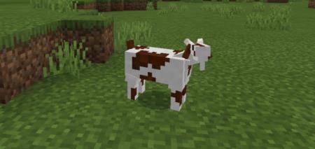 Коза с коричневыми пятнами