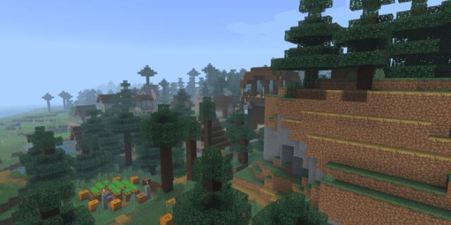 Красивый вид с холма на лес и отдалённую деревню