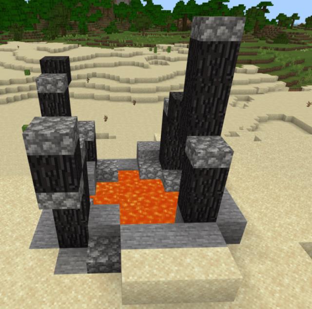 Стволы дерева рядом с лавой