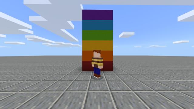 Персонаж рядом с радужными блоками