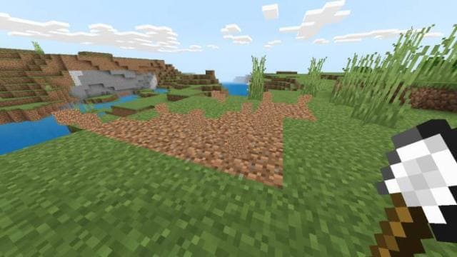 Игрок убирает блоки грязи