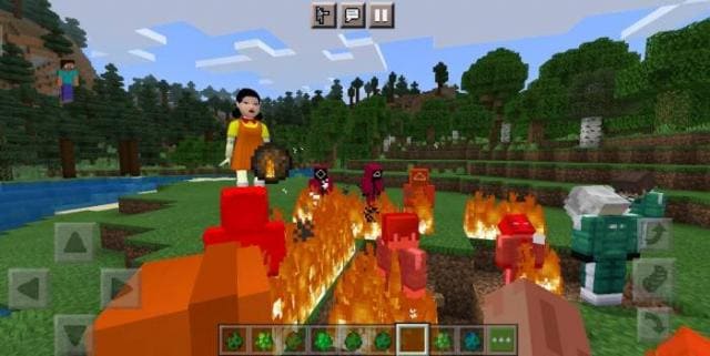 Горящие игроки рядом с куклой