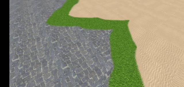 Плавный переход камня, травы и песка