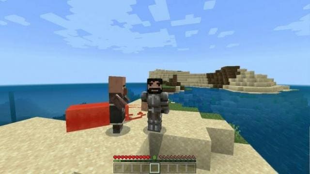 Игрок и деревенский житель на берегу