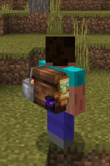 Вещи рядом с сумкой на спине