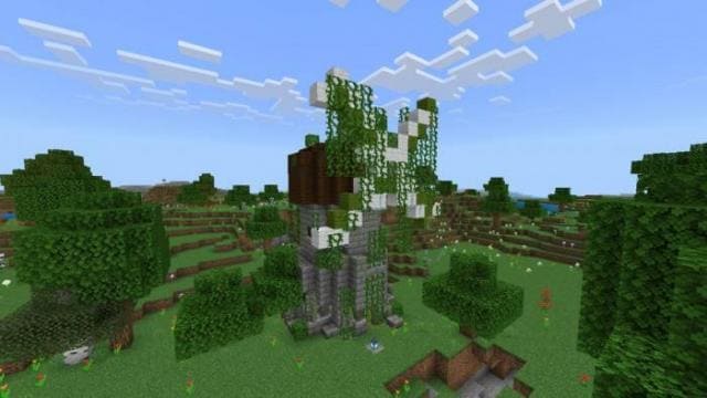 Мельница, покрытая лозой