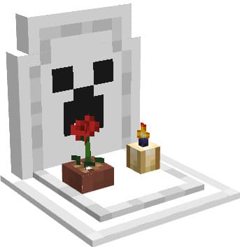 Белое надгробие с лицом крипера