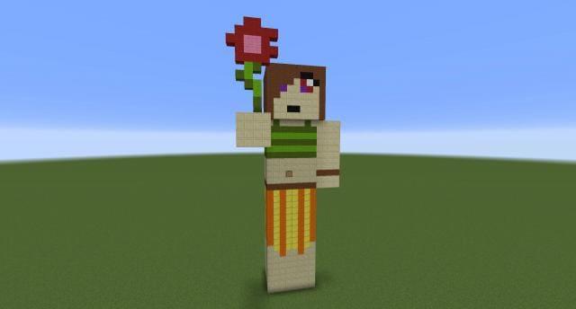 Девочка с цветком вид спереди