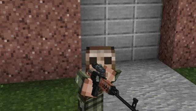 Игрок с винтовкой в руке